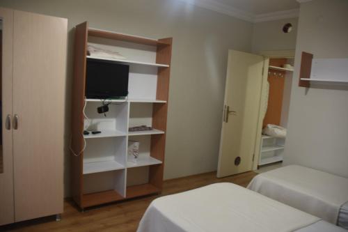 TV a/nebo společenská místnost v ubytování Gün Apart