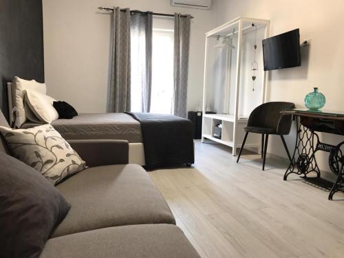 Posezení v ubytování B&B Le Stanze Al Centro