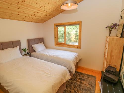 Katil atau katil-katil dalam bilik di Willow Lodge