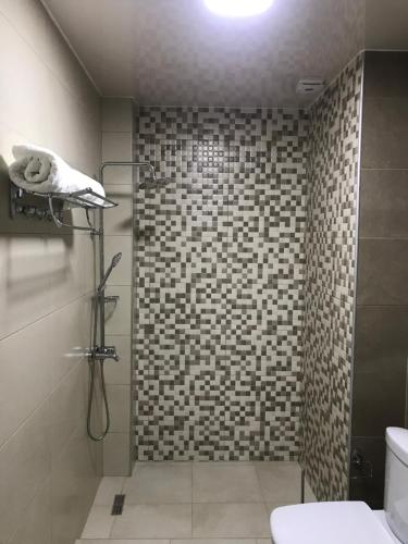 Ванная комната в Hotel FLEUR DE LIS
