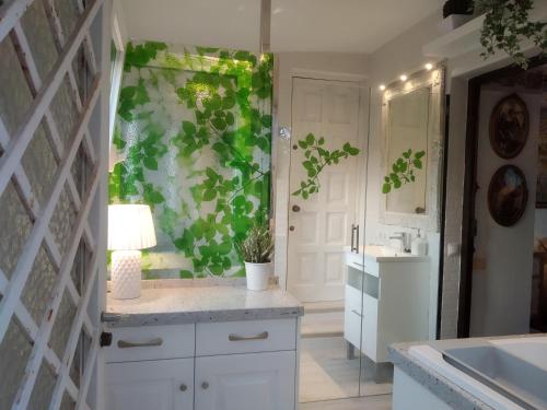 a bathroom with a sink and a counter top at Apartamento con terraza y vistas al mar in Burriana