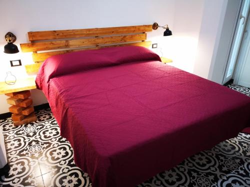 Кровать или кровати в номере Trapani Destinations b&b