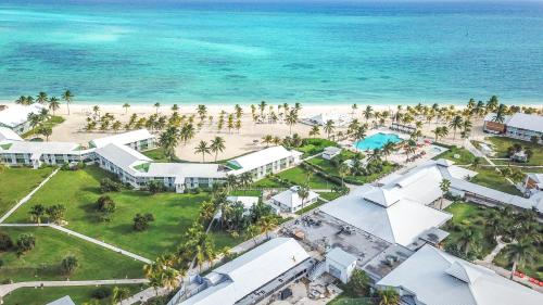an aerial view of a resort and the beach at Viva Fortuna Beach by Wyndham, A Trademark All Inclusive in Freeport