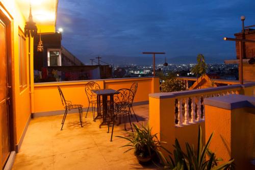 Un balcón o terraza en Peace and Joy Guest House