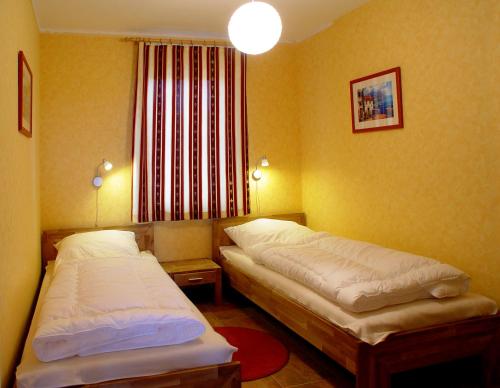 Voodi või voodid majutusasutuse La Mer - Ferienwohnungen toas