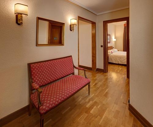 Cama o camas de una habitación en Hotel Hernán Cortés