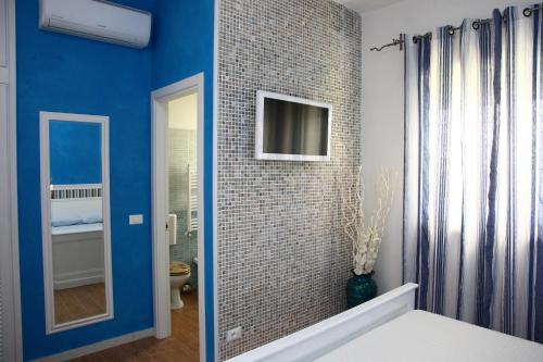 Ένα ή περισσότερα κρεβάτια σε δωμάτιο στο Bedrooms Venezia