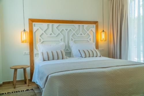 Postel nebo postele na pokoji v ubytování Rethymno Villas