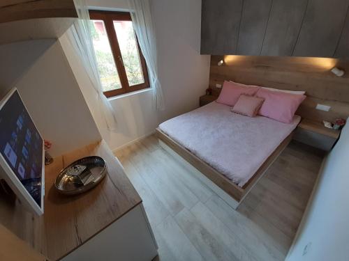 Säng eller sängar i ett rum på Apartment Green Oasis