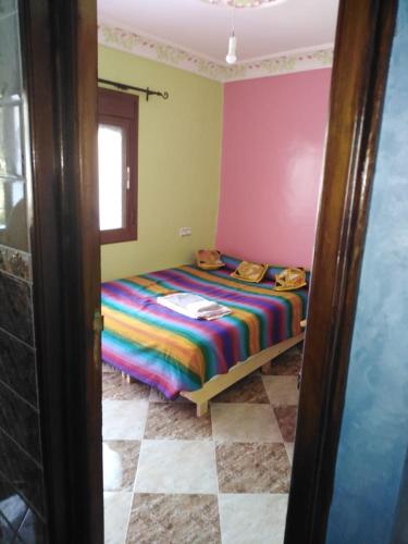 Ένα ή περισσότερα κρεβάτια σε δωμάτιο στο Maison Bahija