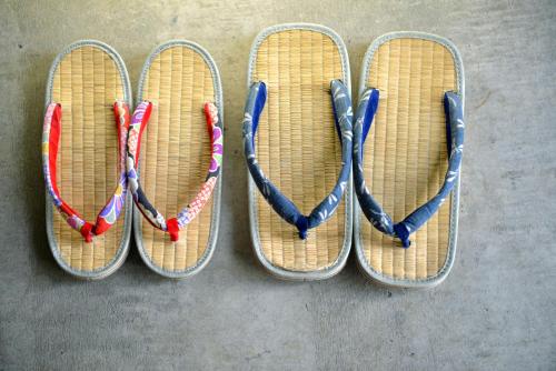a group of four different colored ropes on a pair of ice skates at Andon Ryokan in Tokyo