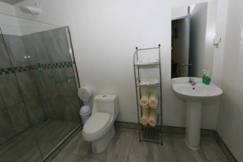 Ein Badezimmer in der Unterkunft Hostel Cattleya - Monteverde, Costa Rica