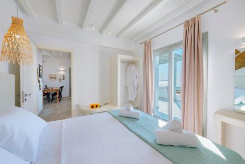 Ένα ή περισσότερα κρεβάτια σε δωμάτιο στο Aelion Villa