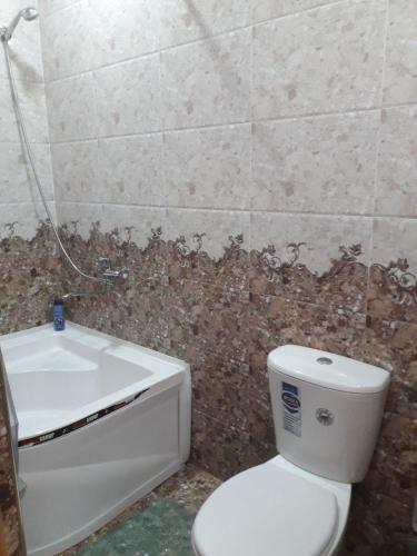 Ένα μπάνιο στο KHIVA ABDULLA Guest House