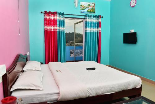 Cama o camas de una habitación en RK Holiday Home