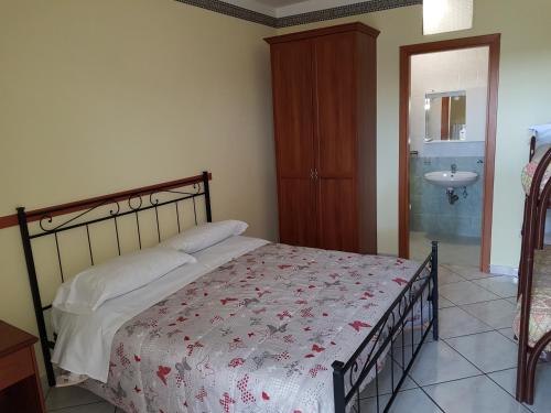 Postel nebo postele na pokoji v ubytování Agriturismo La Selva