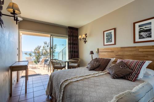 Photo de la galerie de l'établissement Roc Hotel - Hôtel 4 étoiles les pieds dans l'eau, au Lavandou