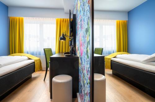 Katil atau katil-katil dalam bilik di Thon Hotel Moldefjord
