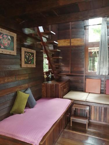 Postel nebo postele na pokoji v ubytování Rustic​ Charm​ Suphan​
