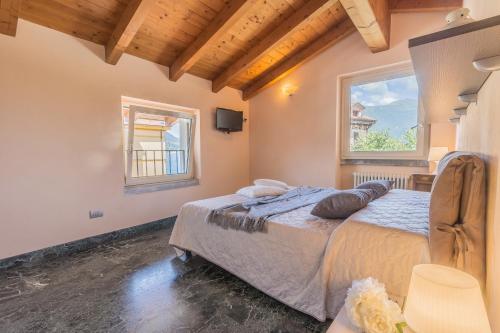 Posteľ alebo postele v izbe v ubytovaní Casa Del Tiglio