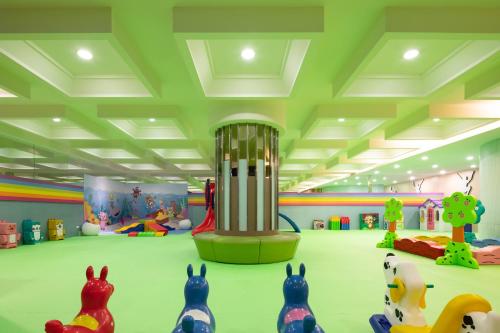 a room filled with lots of plastic rabbits in a play room at Lakeshore Hotel Hsinchu in Hsinchu City