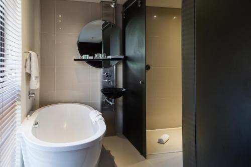 Un baño de Colosseum Hotel