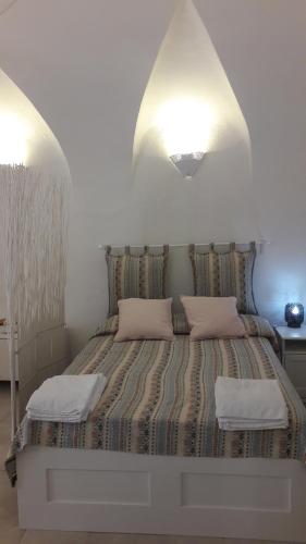 ヴィエステにあるCasa Danielaのベッドルーム1室(ベッド1台、枕2つ付)