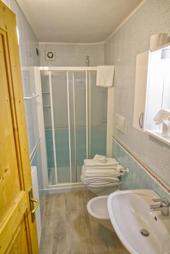 Koupelna v ubytování Residence Miramonti