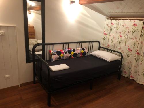 Ένα ή περισσότερα κρεβάτια σε δωμάτιο στο Appartement dans la résidence LES MAZETS DE CAMARGUE