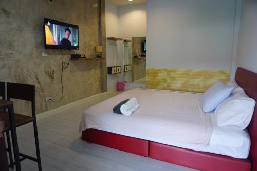 A bed or beds in a room at NONKAJA HOSTEL