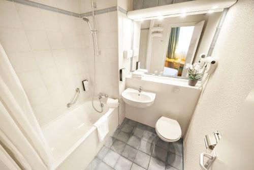 Ванная комната в DC Hotel & Restaurant Brussels South