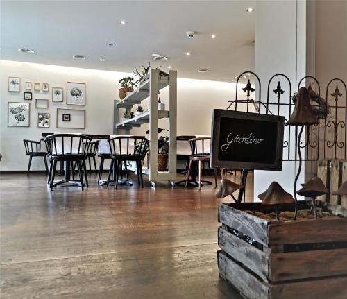 a dining room with a table and chairs in a room at Radisson Blu Hotel, St. Gallen in St. Gallen