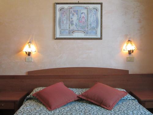 Кровать или кровати в номере Hotel Italia