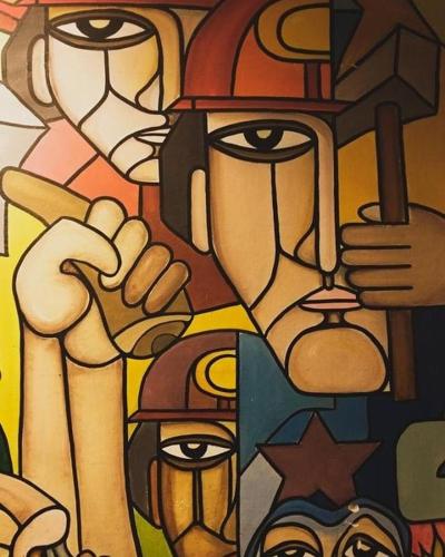 a painting of a group of people on a wall at Giramundo Hostel in Humahuaca