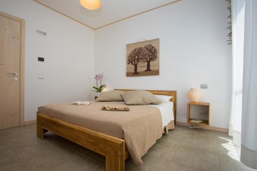 Postel nebo postele na pokoji v ubytování Bio B&B Vivere la Vita