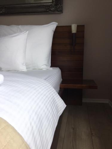 Postel nebo postele na pokoji v ubytování OzApartments