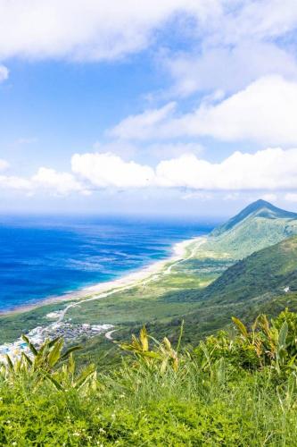 a view of the beach from the top of a mountain at Haven Seaview Homestay in Lanyu