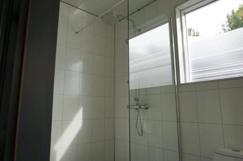 Koupelna v ubytování Hlidarbol Apartments