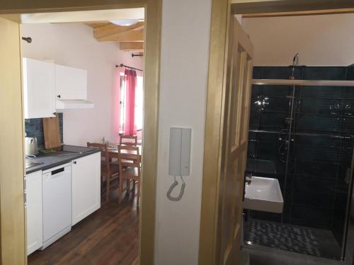 Kuchyň nebo kuchyňský kout v ubytování Apartmány Verunka