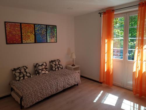 Llit o llits en una habitació de L'Orangerie