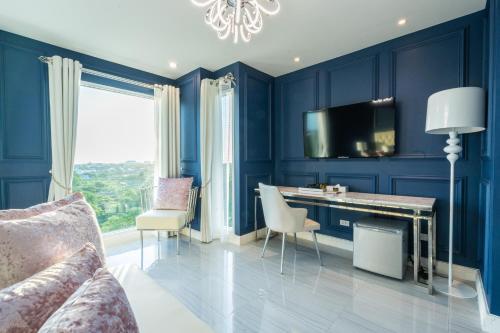 Belle Grand Hotelにあるテレビまたはエンターテインメントセンター