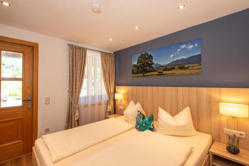 Katil atau katil-katil dalam bilik di Aparthotel Werdenfels