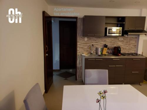 A cozinha ou cozinha compacta de Apartamento el eden
