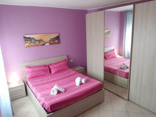 Llit o llits en una habitació de Andrea's Apartments - Zanoli