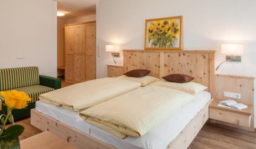 Postel nebo postele na pokoji v ubytování Garni Appartment Wagnerhof