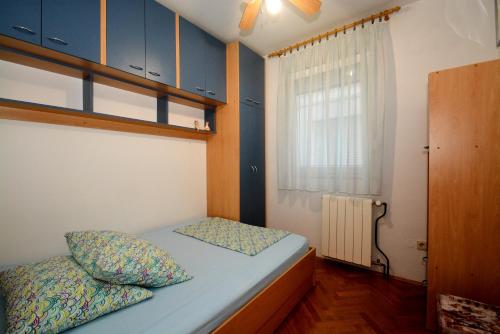 Кровать или кровати в номере Apartman Vanja