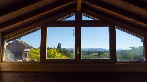 a window in a house with a view at Villa Matildis in Modena