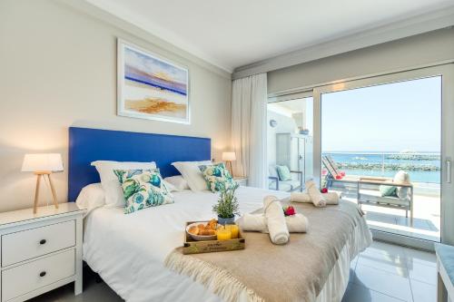 Cama o camas de una habitación en Amarre Beach