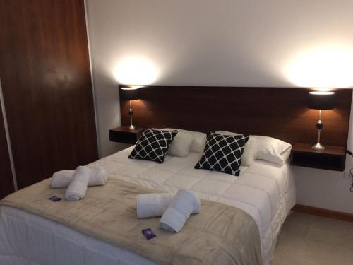 Ένα ή περισσότερα κρεβάτια σε δωμάτιο στο Del Sol Apart Hotel
