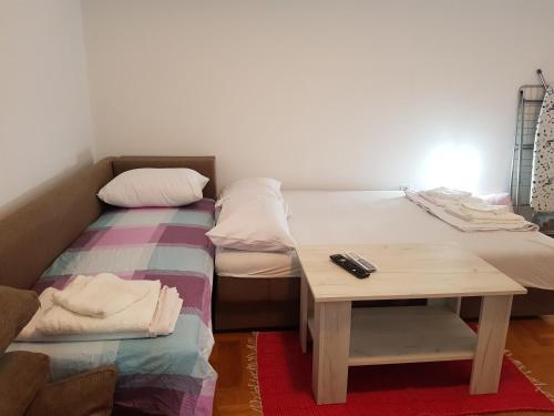 Postelja oz. postelje v sobi nastanitve Studio Dorna